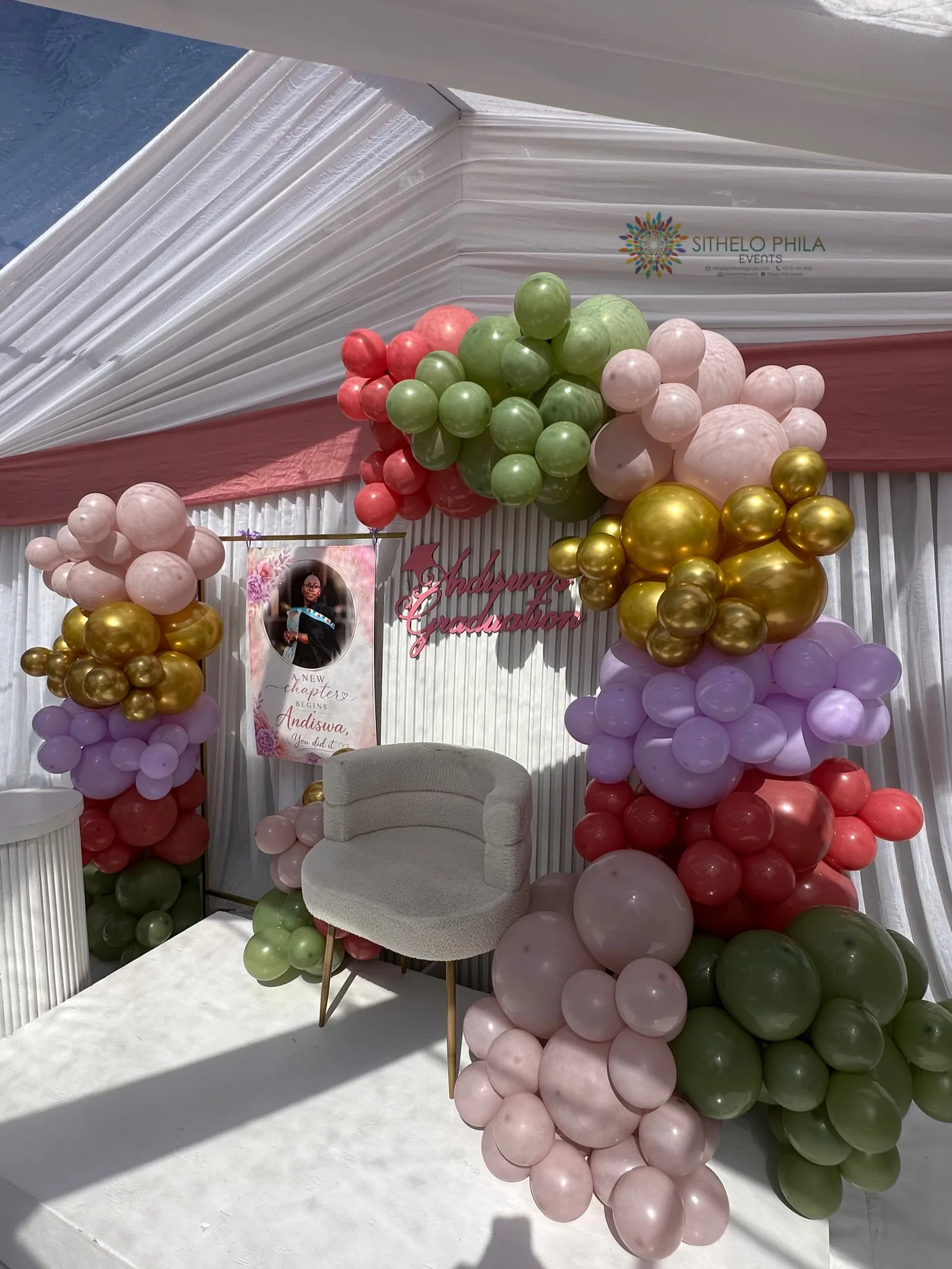 Andiswa's graduation celebration balloon arch in multiple colours