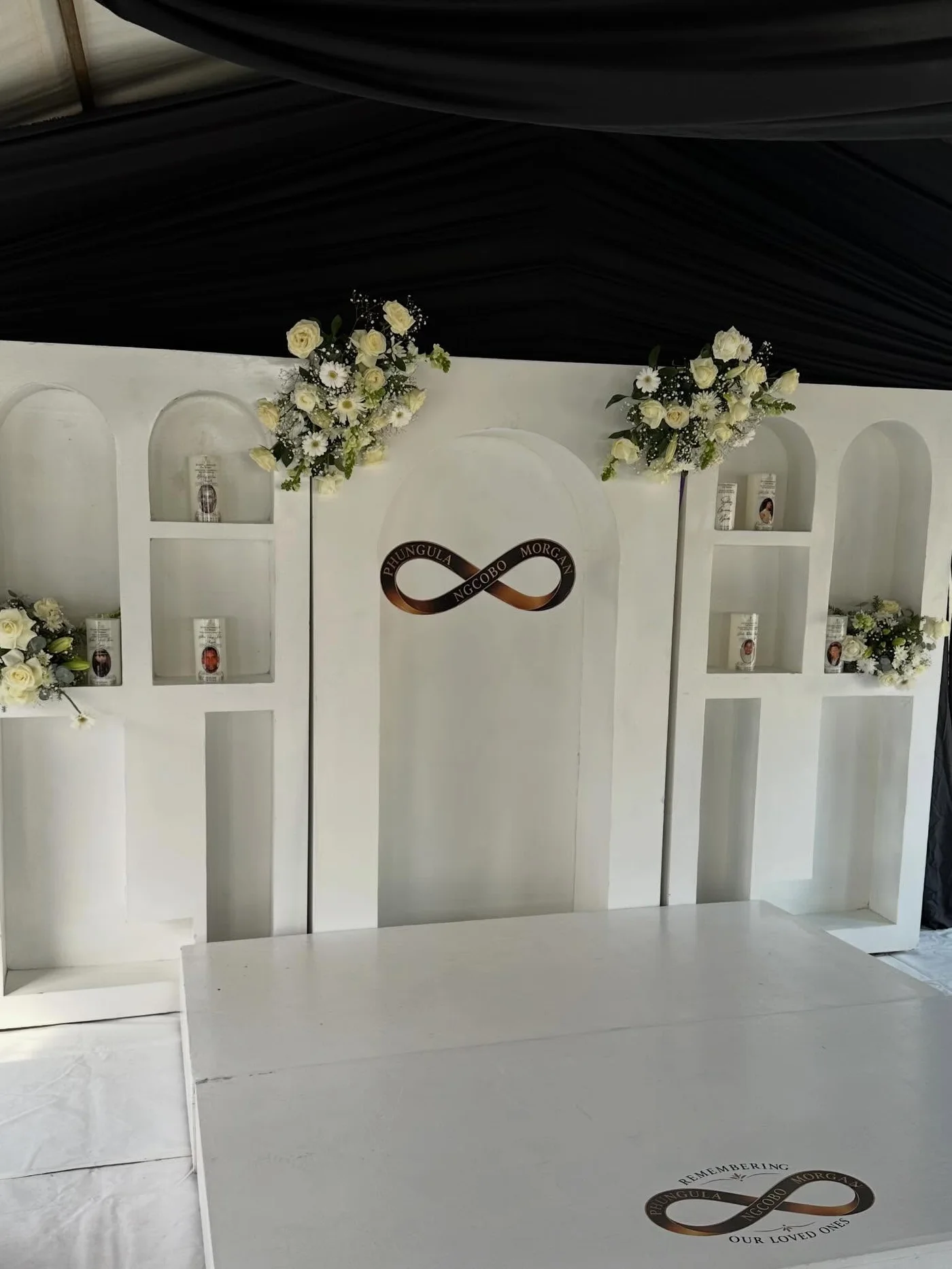 Tombstone unveiling ceremony styled in white, black and gold